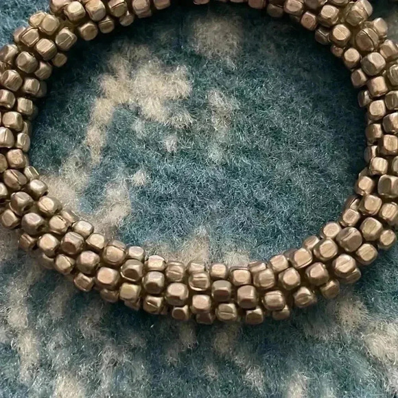 Silver hand beaded elastic stretch pair of bracelets - Picture 3 of 3